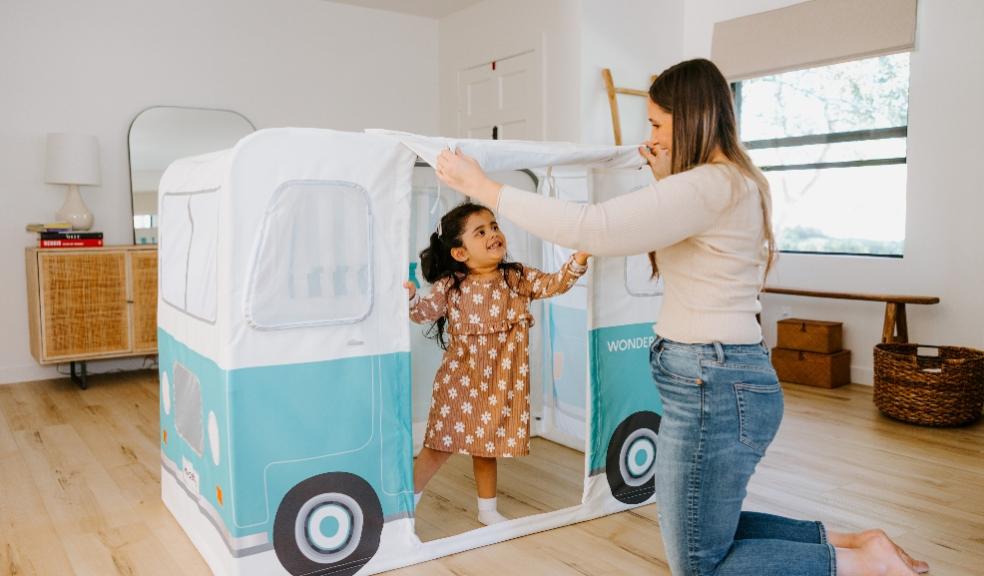 picture of a mum and child playing with Wonderfold pop up play tent