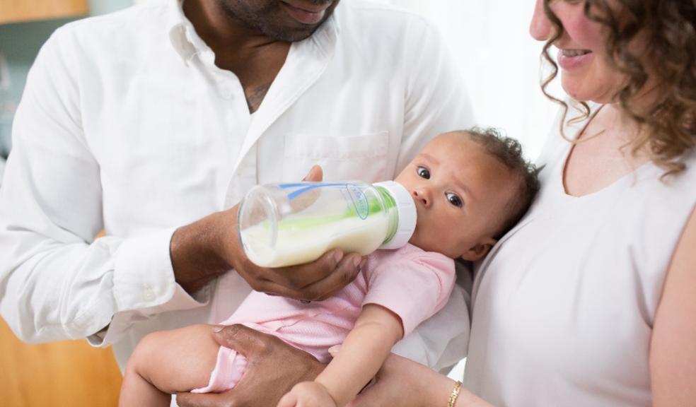 picture of baby drinking from a Dr Browns glass bottle