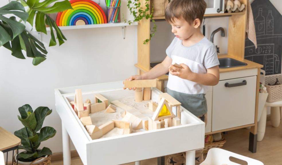 picture of a a child learning in a Montessori way