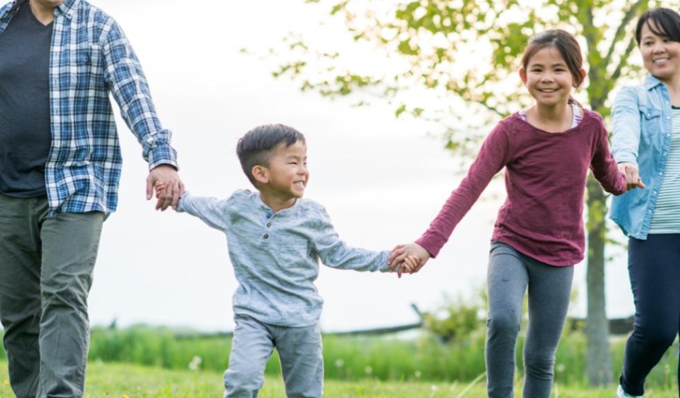 picture of a happy family on a day out