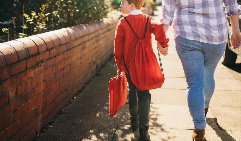 picture of parent walking child to school