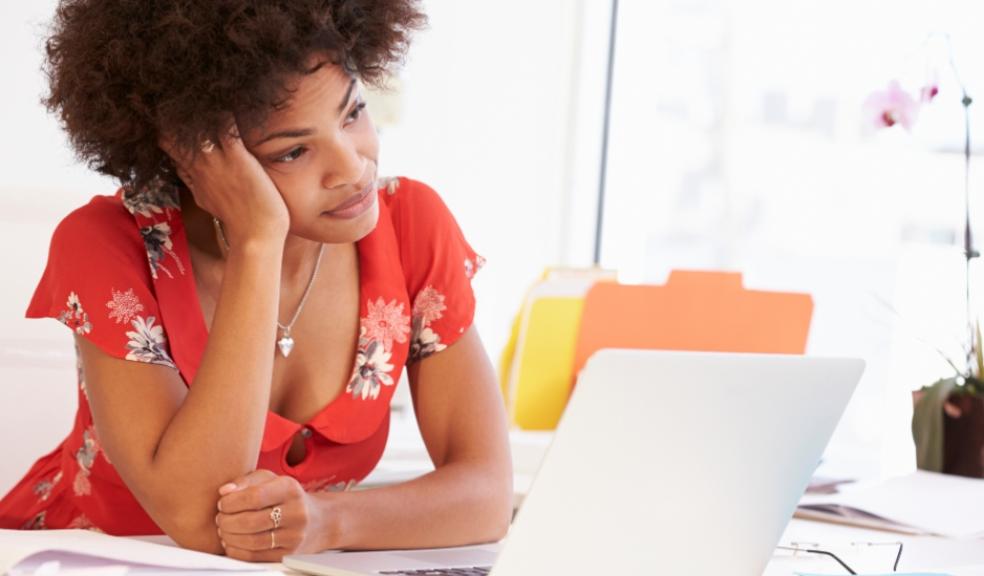 picture of an unhappy woman in the workplace