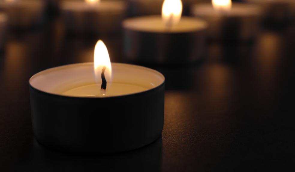 image of lit tealight candles