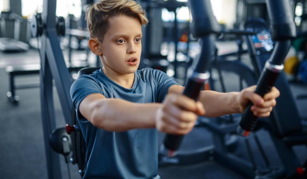 picture of a teenager working out in a gym