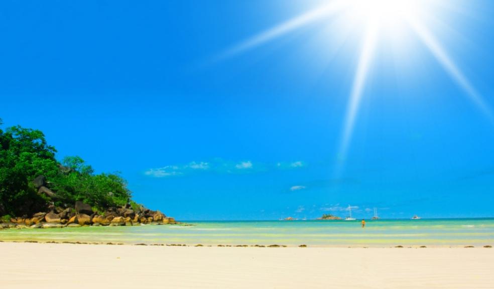 picture of sunshine over a beach