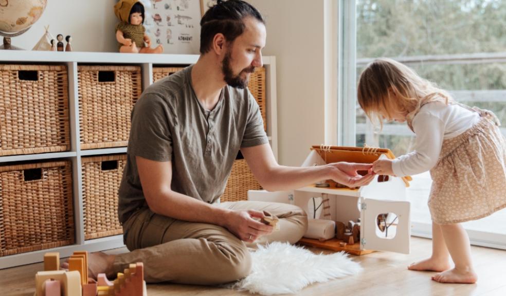 picture of a father and daughter playing