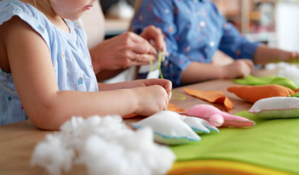 picture of children sewing