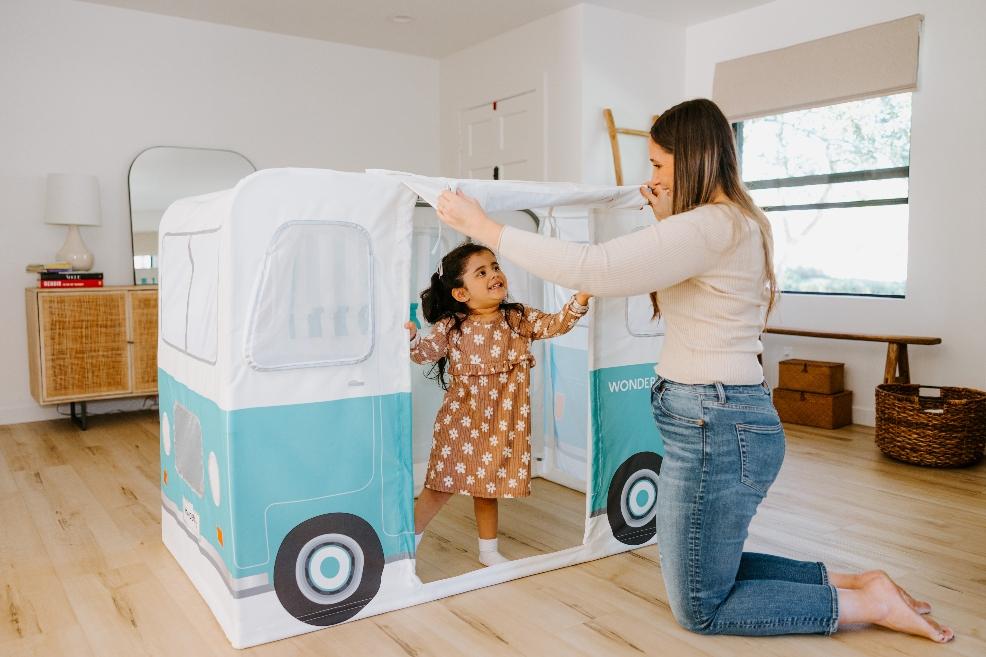 picture of a mum and child playing with Wonderfold pop up play tent