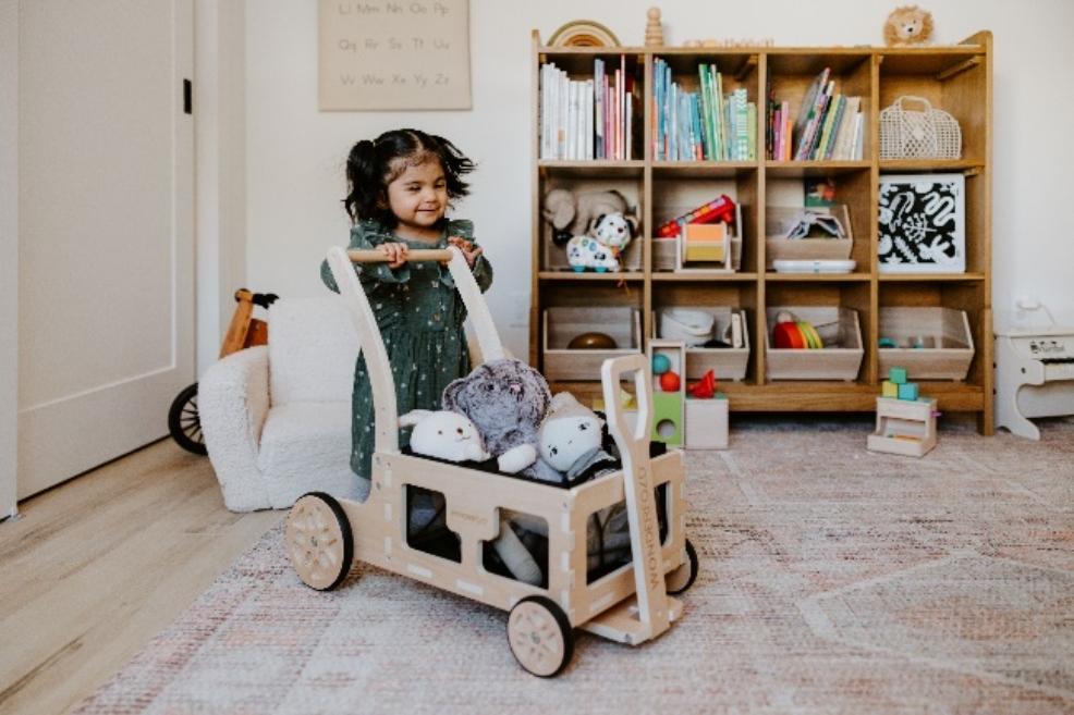 picture of a child playing with Wonderfold step by step walker toy