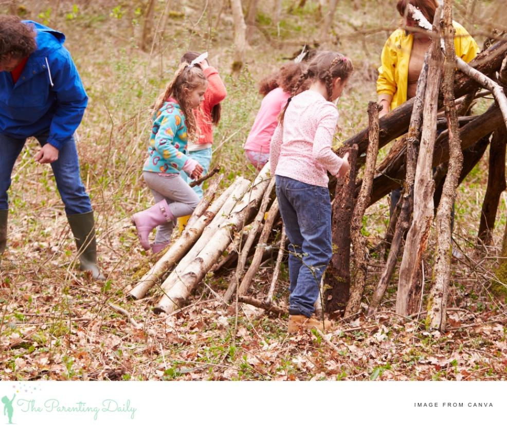 picture of children building dens outside