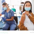 picture of a pregnant woman getting the flu jab