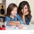 picture of a a mum and child learning to read together