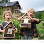 picture of children making a bug hotel