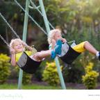 picture of children playing on swings