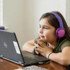 child learning at laptop 