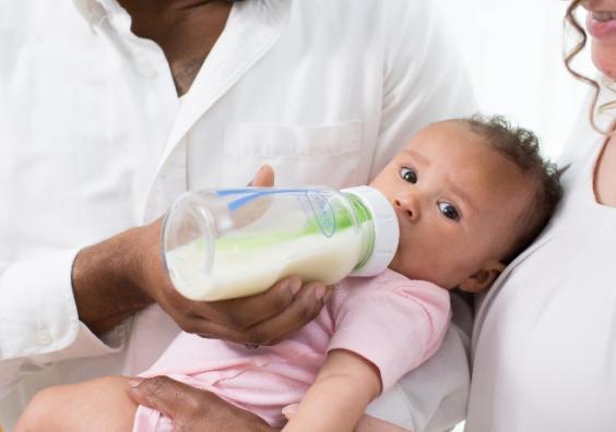 picture of baby drinking from a Dr Browns glass bottle