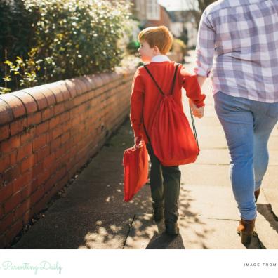 picture of parent walking child to school