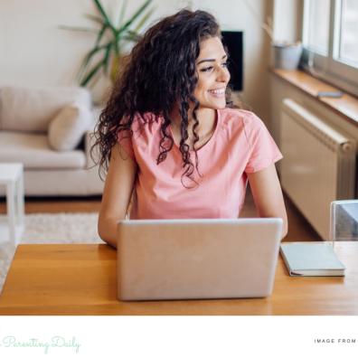 picture of a happy woman working from home