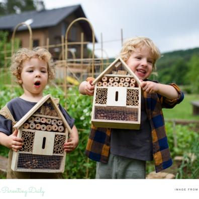 picture of children making a bug hotel