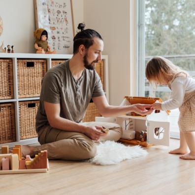 picture of a father and daughter playing