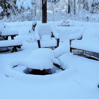 picture of outdoor furniture covered in snow