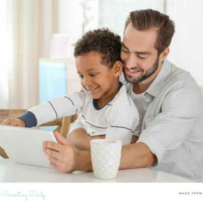 picture of a parent and child using a smart device together