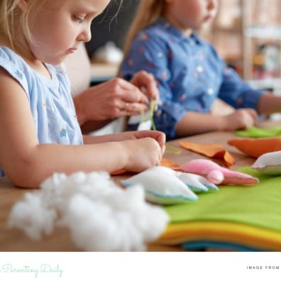 picture of children sewing